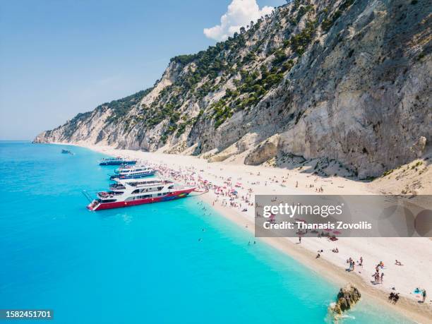 aerial view of famous egremni beach, lefkada island, greece. - egremni beach stock pictures, royalty-free photos & images