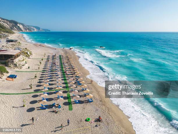 top down aerial view of gialos beach, lefkada island, greece. - levkas stock pictures, royalty-free photos & images