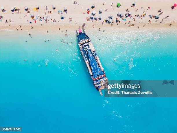 top down aerial view of egremni beach, lefkada island, greece. - egremni beach stock pictures, royalty-free photos & images