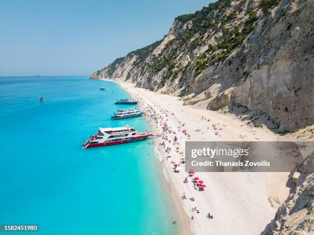 aerial view of egremni beach, lefkada island, greece. - egremni stock pictures, royalty-free photos & images