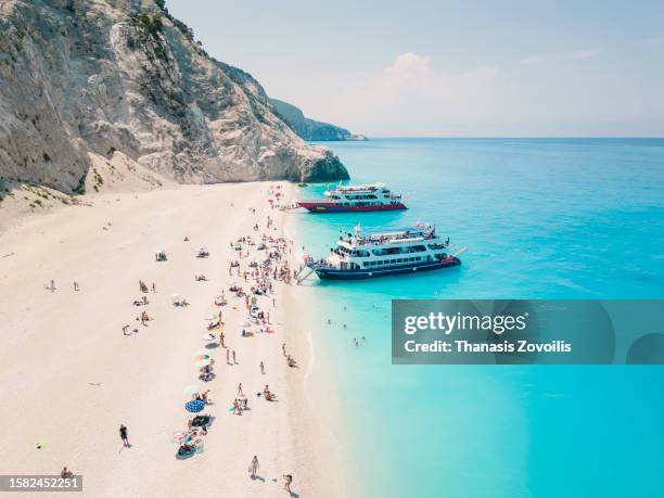 top down aerial view of egremni beach, lefkada island, greece. - egremni stock pictures, royalty-free photos & images
