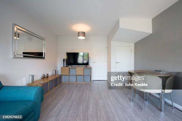 property lounge interiors - wood laminate flooring stock pictures, royalty-free photos & images