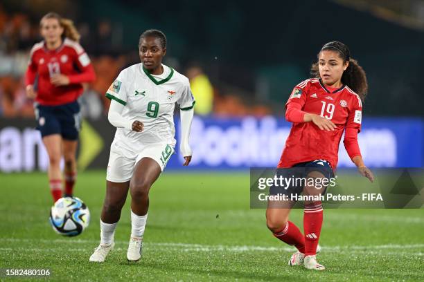 Alexandra Pinell of Costa Rica passes the ball from Hellen Mubanga of Zambia during the FIFA Women's World Cup Australia & New Zealand 2023 Group C...