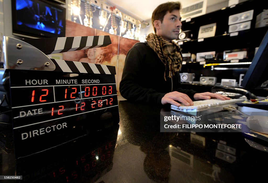 2012 Clock A clock reads in an electronic shop on December 12, 2012. AFP PHOTO ...