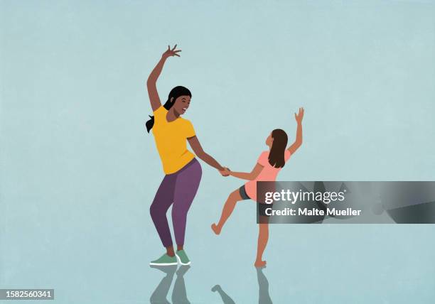 happy mother and daughter holding hands and dancing - arms up stock illustrations