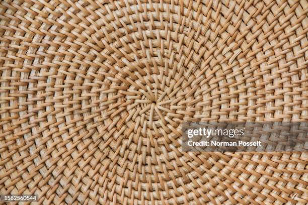 full frame view from above circular rattan placement - korbware stock-fotos und bilder