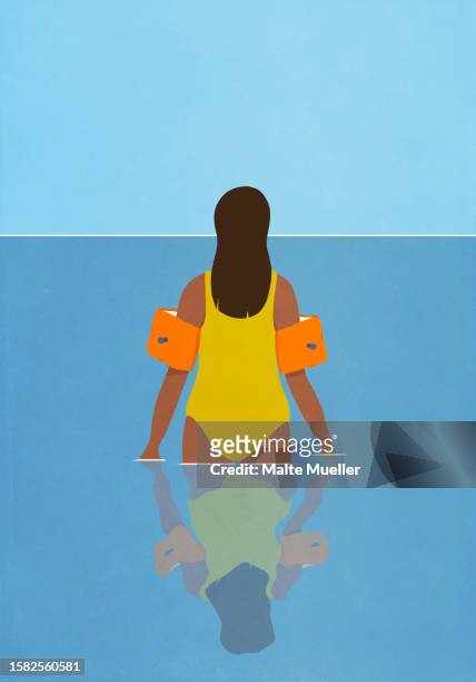 woman in bathing suit and water wings wading in ocean water - negative emotion stock illustrations