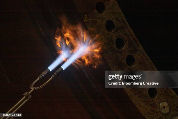 a blowtorch heating metal - blow torch stock pictures, royalty-free photos & images