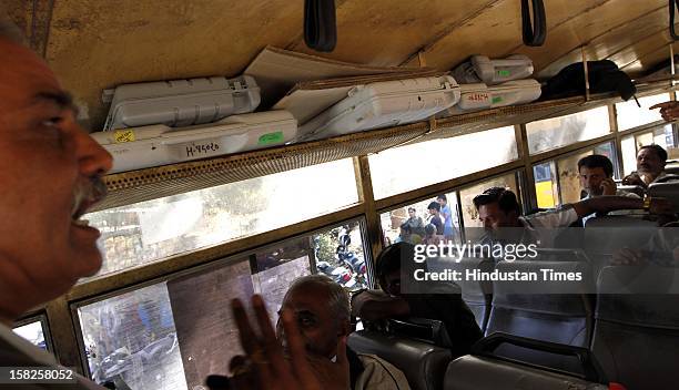 Election duty staffs with Electronic Voting Machine leaving for their respective booths for the first phase of Gujarat assembly election on December...