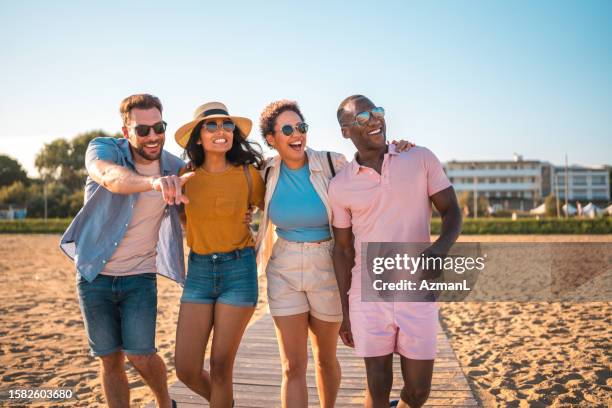 Hugging Friends Different Races Different Races Hugging Photos and Premium High Res Pictures - Getty Images