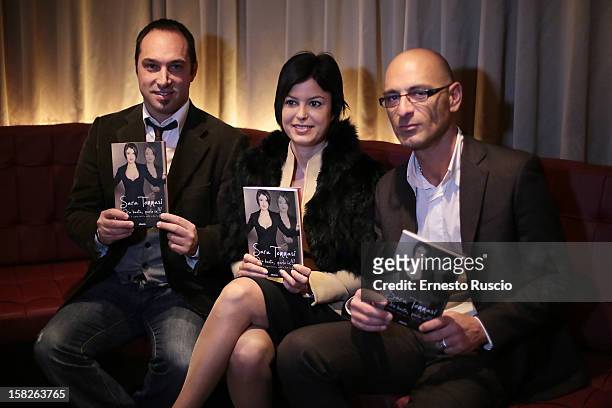 Cristiano De Masi, Sara Tommasi and Corrado Ferrante attend the Book Launch 'Ora Basta Parlo Io' at Elle Restaurant on December 12, 2012 in Rome,...