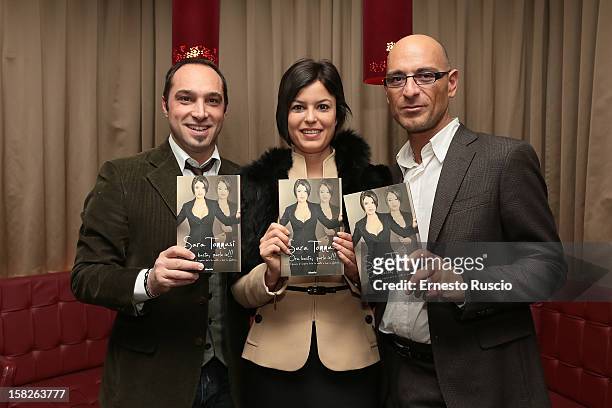 Cristiano De Masi, Sara Tommasi and Corrado Ferrante attend the Book Launch 'Ora Basta Parlo Io' at Elle Restaurant on December 12, 2012 in Rome,...