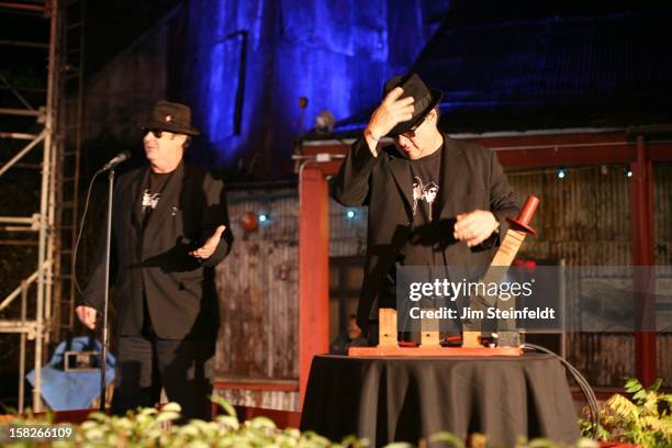 Dan Aykroyd and Jim Belushi as the Blues Brothers open the ceremony for the 20th Anniversary at the House of Blues in Los Angeles, California on...