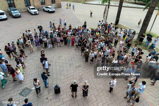 Residents of the Nou Barris district gathered in the Plaza de la Seu in the Nou Barrisa district during a rally for the femicide in the early hours...