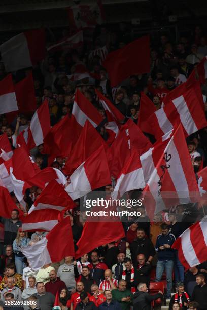Sunderland fans wave Red and White flags during the Sky Bet Championship match between Sunderland and Ipswich Town at the Stadium Of Light,...