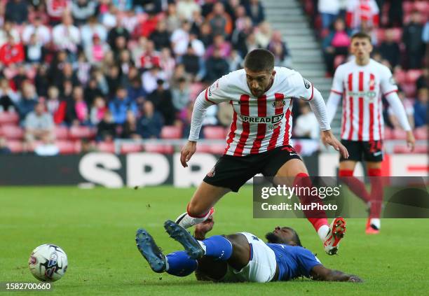 Sunderland's Lynden Gooch jumps over Ipswich Town's Greg Leigh during the Sky Bet Championship match between Sunderland and Ipswich Town at the...