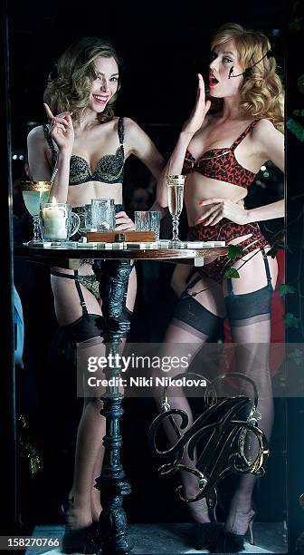 Models pose as Josephine De La Baume opens the new Agent Provocateur store on Grosvenor Street on December 11, 2012 in London, England.