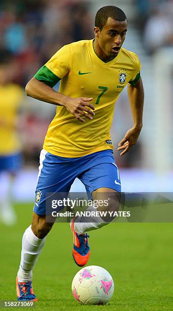 Brazilian midfielder Lucas Moura controls the ball during the London 2012 Olympic games warm up football match between Great Britain and Brazil at...