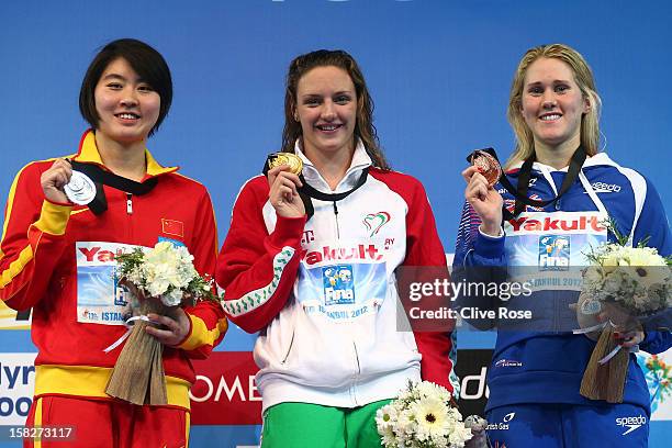 Jiao Liuyang of China, Katinka Hosszu of Hungary and Jemma Lowe of Great Britain pose with their medals after the Women's 200m Butterfly Final during...
