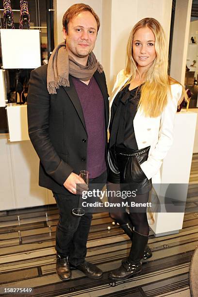 Nicholas Kirkwood and Florence Brudenell Bruce attend a Christmas drinks hosted by designer Nicholas Kirkwood to celebrate his partnership with...