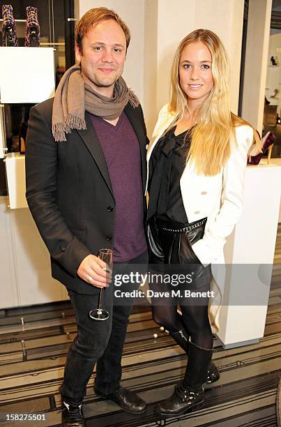 Nicholas Kirkwood and Florence Brudenell Bruce attend a Christmas drinks hosted by designer Nicholas Kirkwood to celebrate his partnership with...