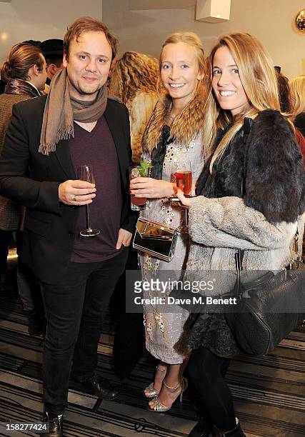 Nicholas Kirkwood, Martha Ward and Ashley Warwa attend a Christmas drinks hosted by designer Nicholas Kirkwood to celebrate his partnership with...