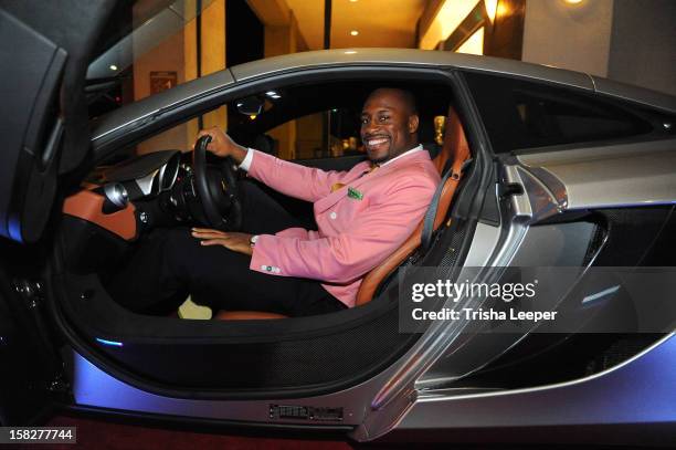 Founder Vernon Davis arrives in the MclarenMP4-12C to the opening of Art Gallery 85 In Santana Row To Help Raise Money For Intercity Arts Foundation...