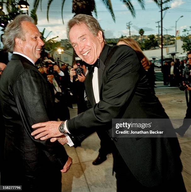 Editor of Vanity Fair, Graydon Carter and actor Warren Beatty are photographed for Vanity Fair Magazine on March 24, 2002 at the Vanity Fair Oscar...