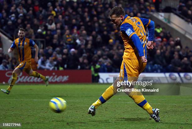 Louis Briscoe of Mansfield scores their second goal during the FA Cup with Budweiser Second Round replay match between Mansfield Town and Lincoln...