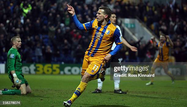 Louis Briscoe of Mansfield celebrates after he scores their second goal during the FA Cup with Budweiser Second Round replay match between Mansfield...