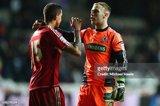 Seb Hines of Middlesbrough scorer of an own goal in his sides 0-1 defeat is consoled on the final whistle by team mate Jason Steele during the...