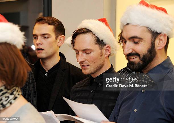 Dan Gillespie Sells performs with The Bistotheque Choir at a Christmas drinks hosted by designer Nicholas Kirkwood to celebrate his partnership with...