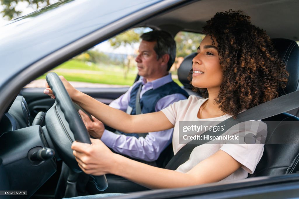 Young woman taking her driving test