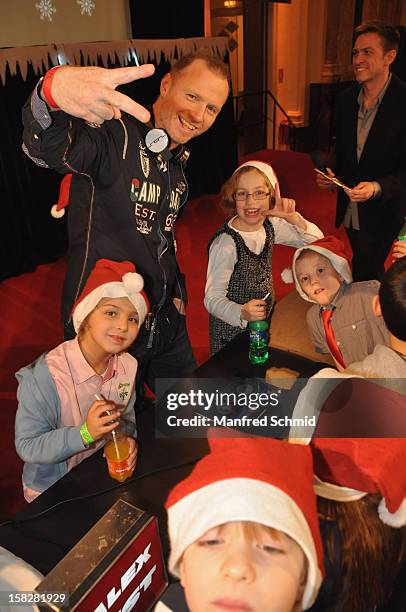 Alex List with some children attend the Christmas ball for children Energy For Life - Heat For Children's Hearts at Hofburg Vienna on December 11,...