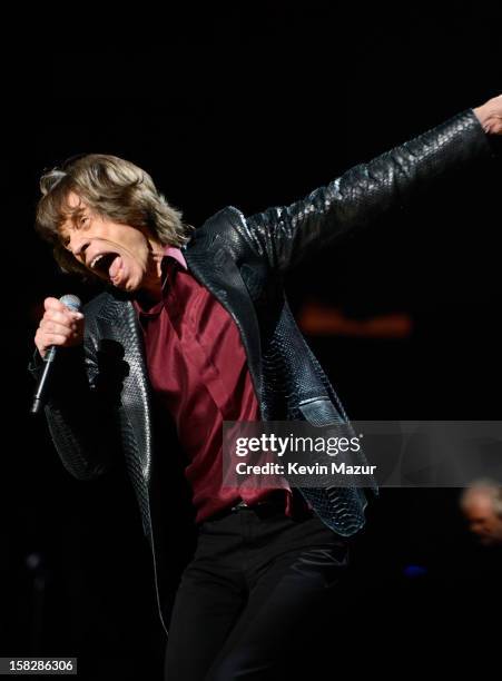 Mick Jagger of The Rolling Stones performs at "12-12-12" a concert benefiting The Robin Hood Relief Fund to aid the victims of Hurricane Sandy...
