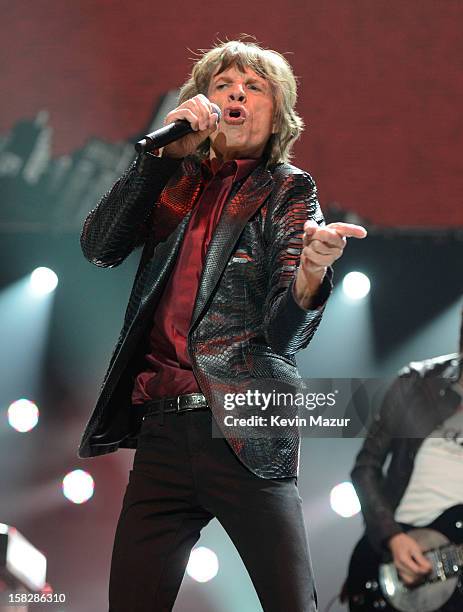 Mick Jagger of The Rolling Stones performs at "12-12-12" a concert benefiting The Robin Hood Relief Fund to aid the victims of Hurricane Sandy...