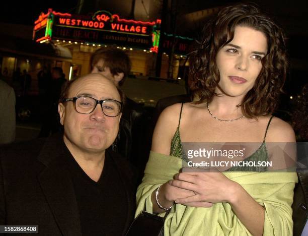 Actor Danny DeVito and co-star Neve Campbell arrive at the premiere of their new film "Drowning Mona" 28 February 2000. The film also stars Jamie Lee...