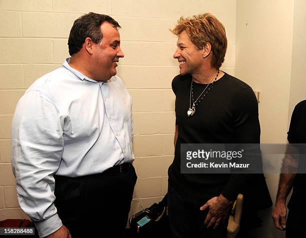 New Jersey Governor Chris Christie and Jon Bon Jovi backstage during "12-12-12" a concert benefiting The Robin Hood Relief Fund to aid the victims of...