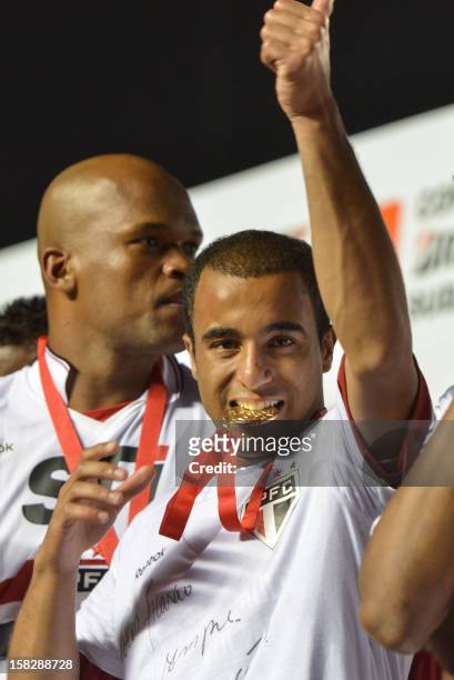 Lucas of Brazil's Sao Paulo celebrates for the victory of their Copa Sudamericana football final match against Argentine's Tigre at Morumbi stadium...
