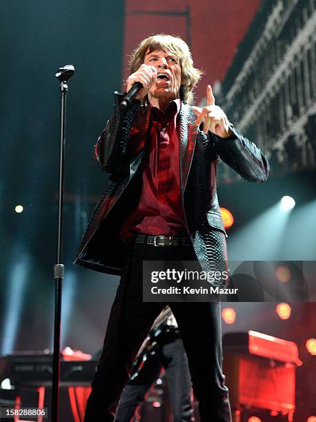 Mick Jagger of The Rolling Stones performs at "12-12-12" a concert benefiting The Robin Hood Relief Fund to aid the victims of Hurricane Sandy...