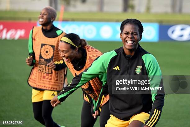 Jamaica's Khadija Shaw and teammates Allyson Swab and Deneisha Blackwood take part in a training session in Melbourne on August 7 on the eve of the...