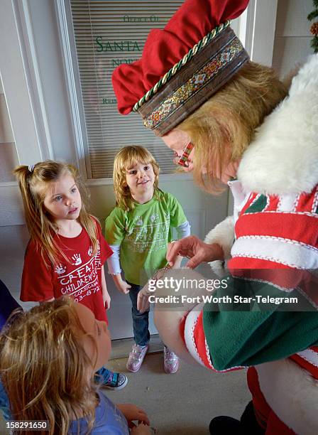 Roberta Smith talks with kids touring the Double R Reindeer Ranch in Midlothian, Texas, on December 4, 2012.