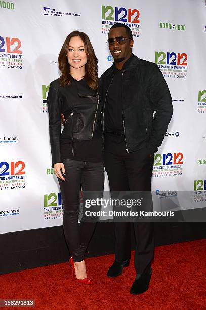 Olivia Wilde and Sean John Combs attend "12-12-12" a concert benefiting The Robin Hood Relief Fund to aid the victims of Hurricane Sandy presented by...