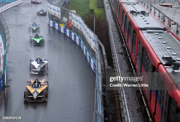 Drivers race under a yellow flag as heavy rain falls during the ABB FIA Formula E Championship - 2023 Hankook London E-Prix Round 16 on July 30, 2023...