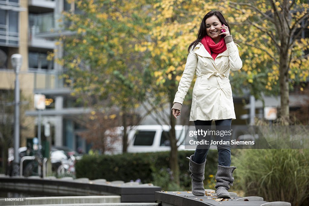 A woman using her cell phone.