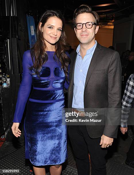 Katie Holmes and Jason Sudeikis backstage during "12-12-12" a concert benefiting The Robin Hood Relief Fund to aid the victims of Hurricane Sandy...