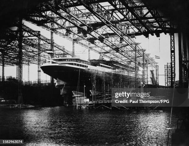 The SS Normandie, a French ocean liner on the slips moments before her launch from the shipyard at Saint-Nazaire, France, 29th October 1932. Built by...