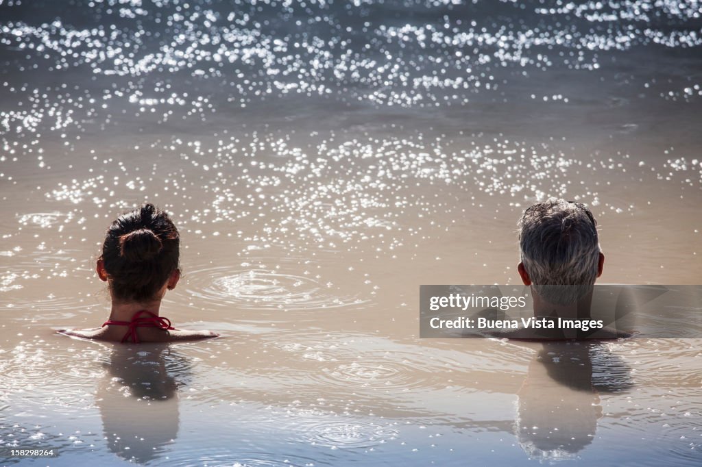 Couple in therapeutic mud bath