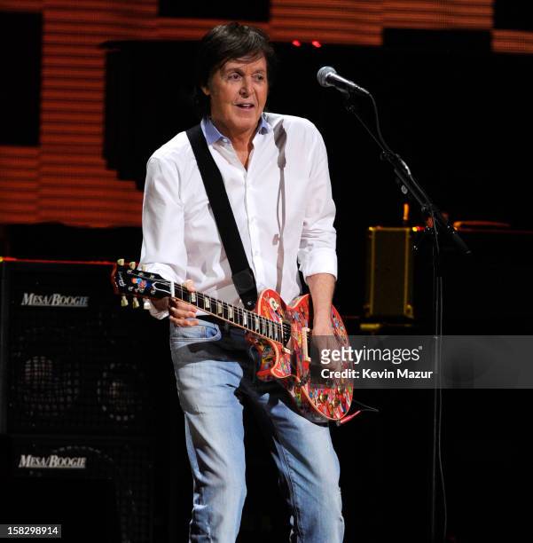 Sir Paul McCartney performs at "12-12-12" a concert benefiting The Robin Hood Relief Fund to aid the victims of Hurricane Sandy presented by Clear...