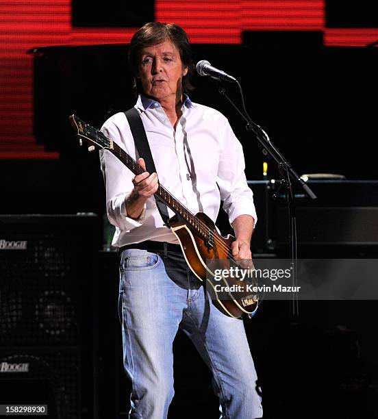 Sir Paul McCartney performs at "12-12-12" a concert benefiting The Robin Hood Relief Fund to aid the victims of Hurricane Sandy presented by Clear...